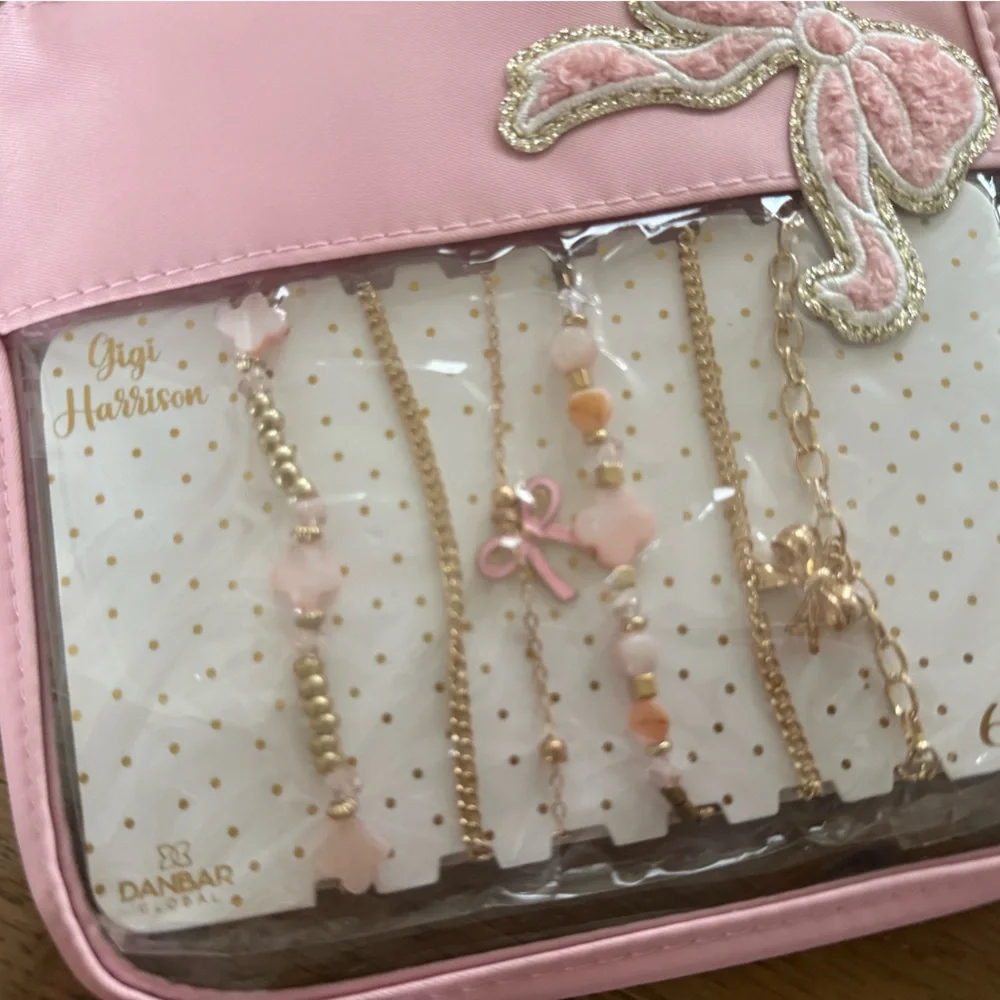 Gigi Harrison by Danbar 6 piece bracelet with bow clear pouch